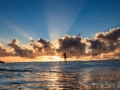 Martin paddling into the sunrise